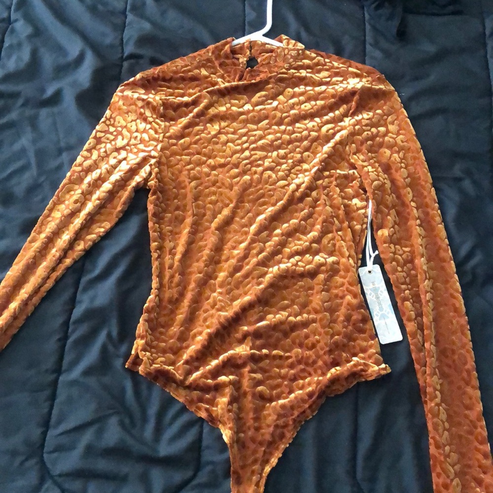 Neck hugging bodysuit